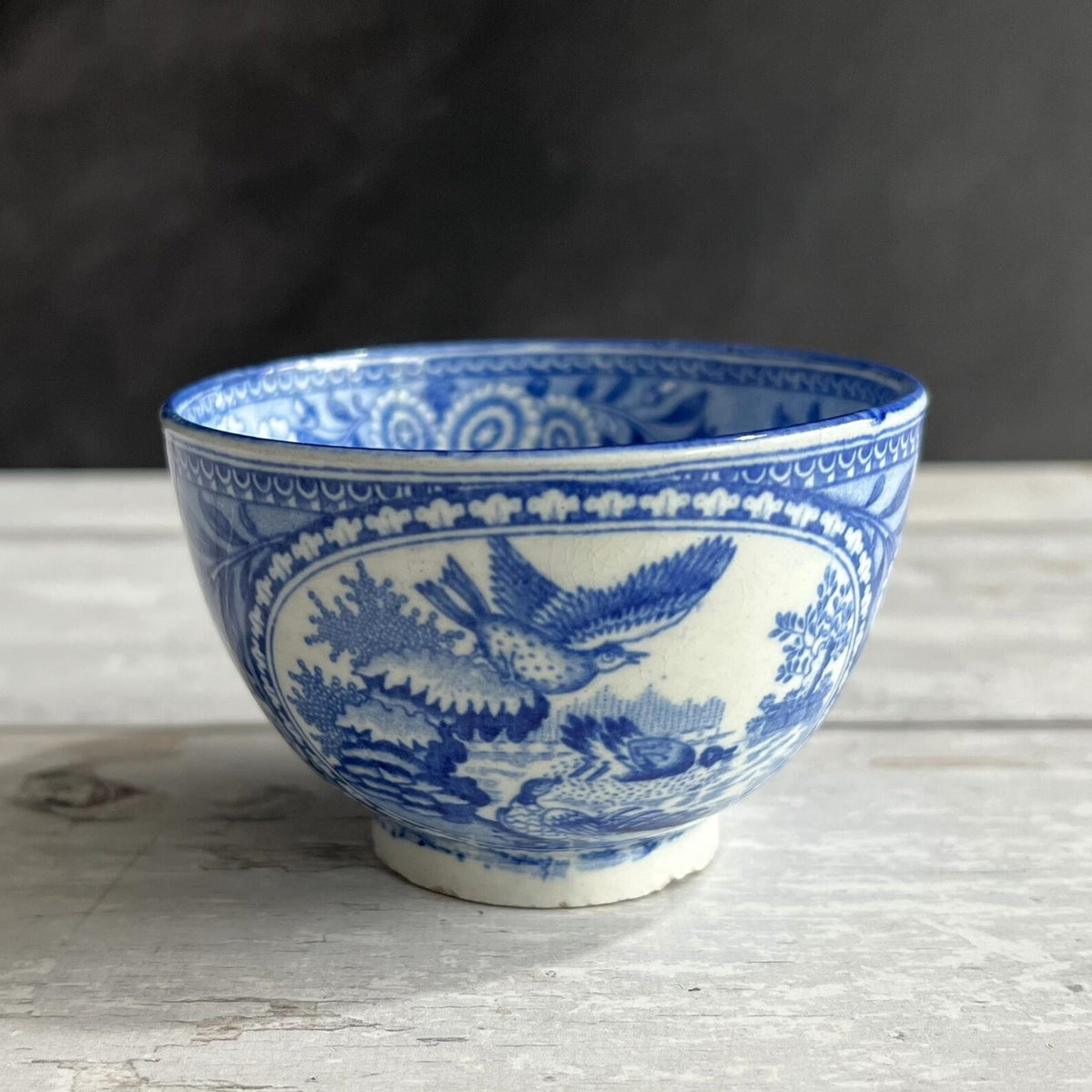 Antique 1820s English Pearlware Tea Bowl and Saucer, Blue Willow Bird Design
