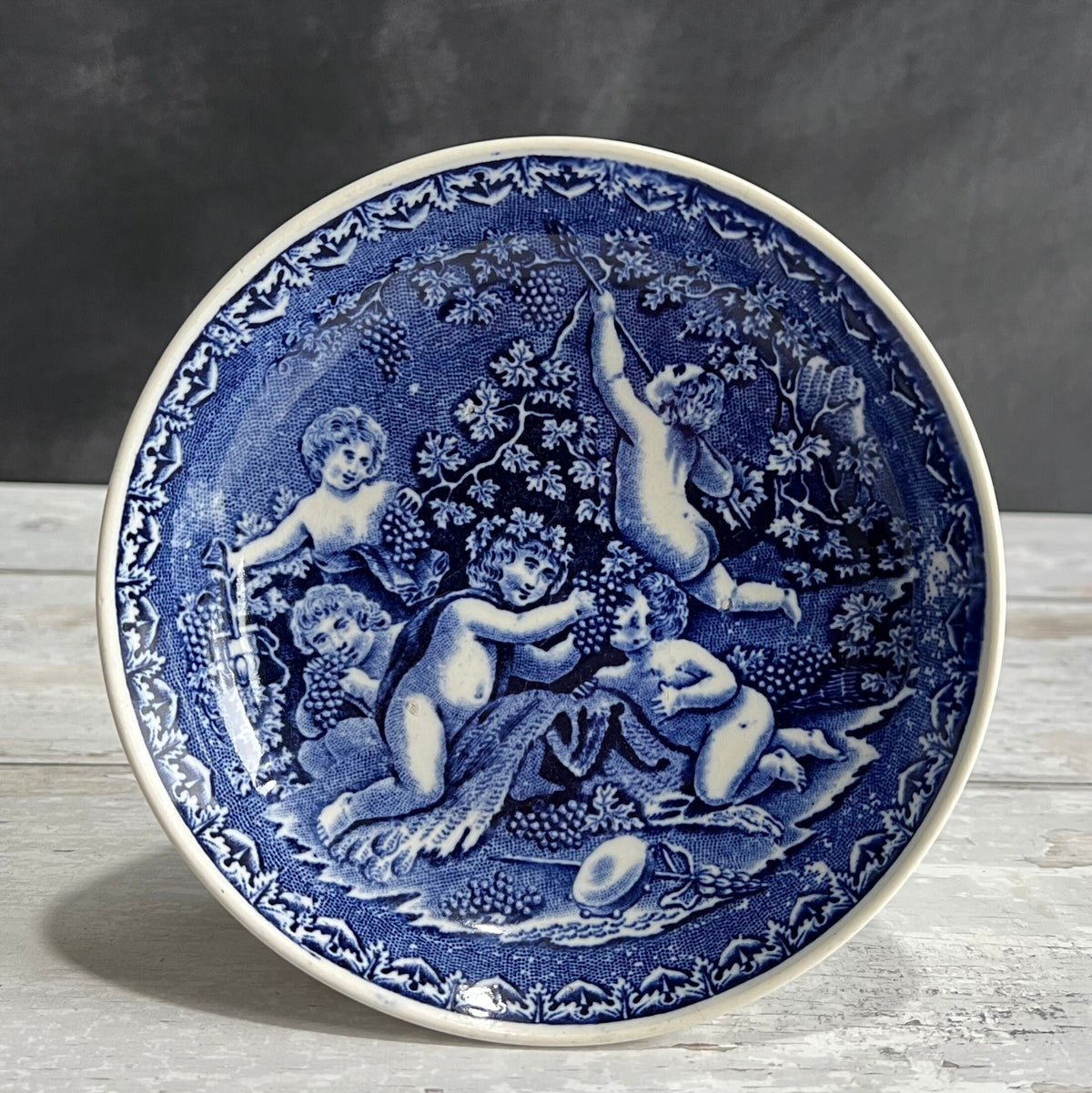 19th Century Transferware Tea Bowl And Saucer Bacchanalian Cherubs Scene Blue And White C 1815